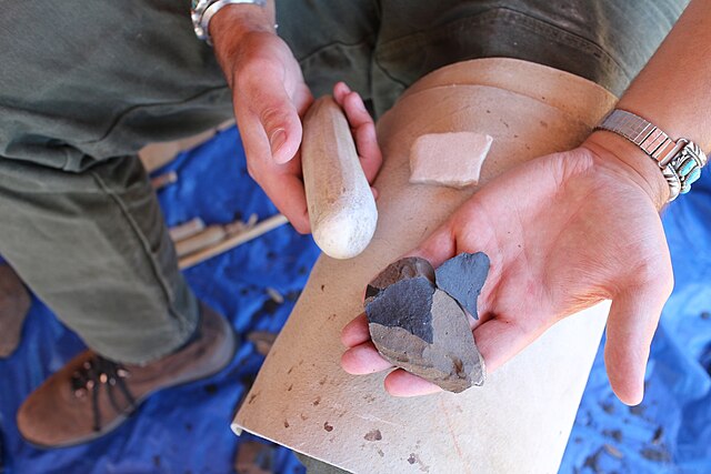 Photograph of a flint knapping demonstration